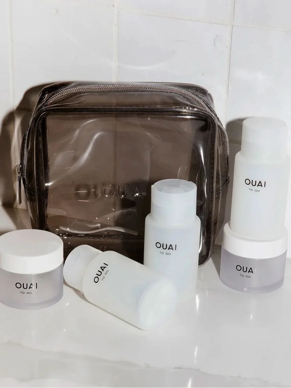 OUAI TO GO REFILLABLE TRAVEL BOTTLE KIT (empty)